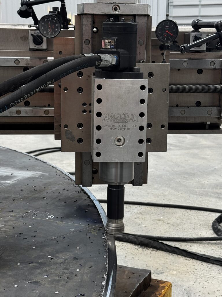 Face mill cutting the outer edge of a large steel flange during field machining