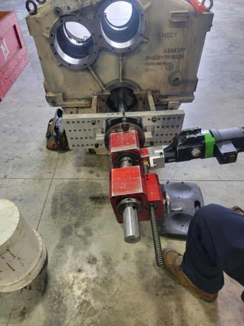 portable line boring machine aligned to gearbox bore