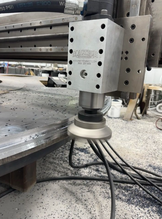 Large diameter flange facer milling the outer edge of a steel flange on-site